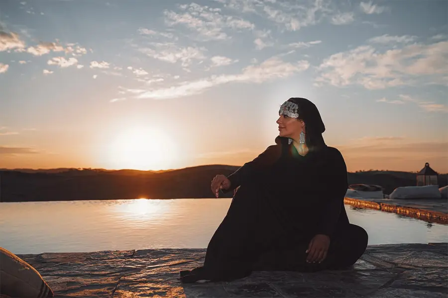 Portrait in a silver Berber headdress at sunset over the desert - portrait photographer Marrakech